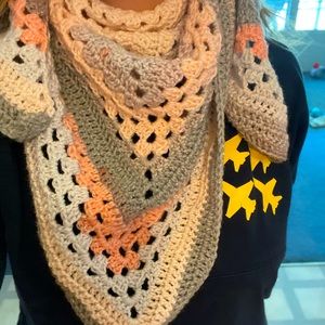 This is a multi colored shawl/scarf with some sparkle for any girl!